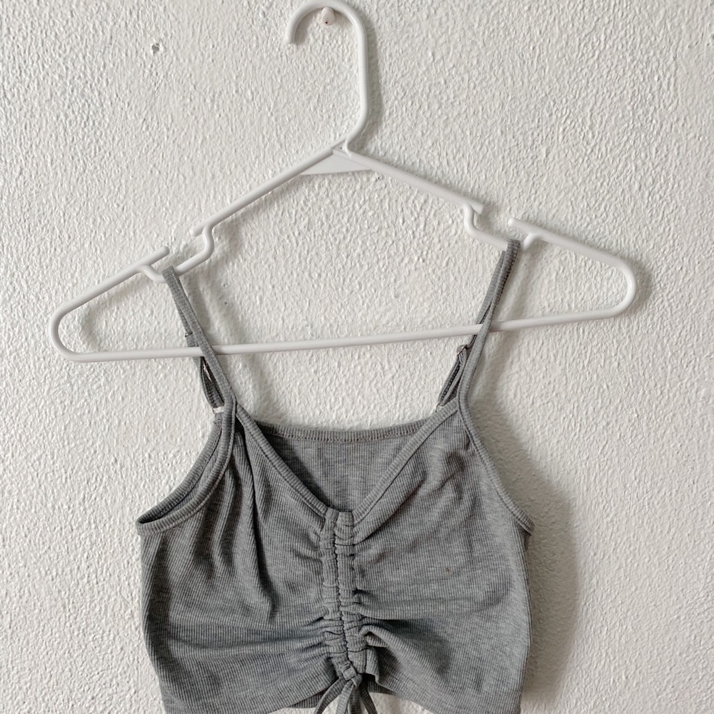 cute gray top with tie in the middle